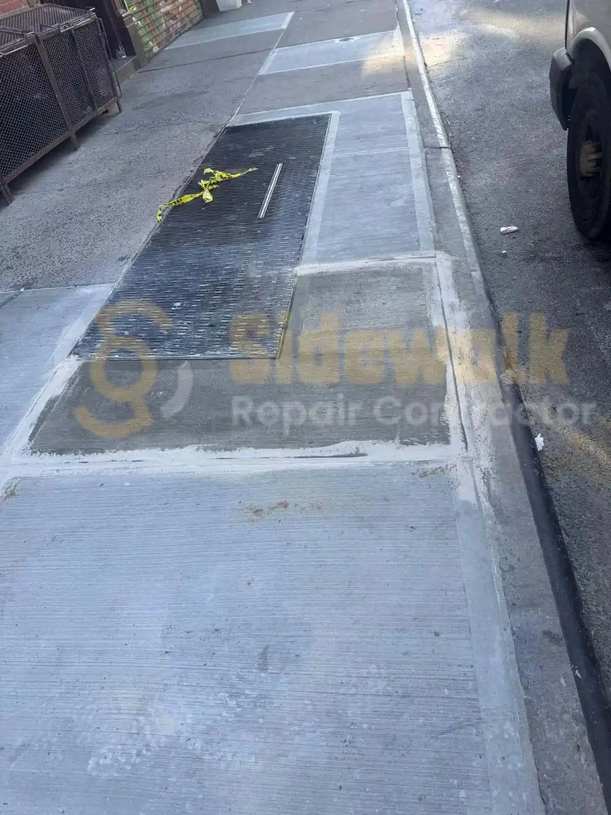 Contractor inspecting and addressing sidewalk violations in New York City